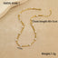 Gold necklace with pearls on a beige background, showing chain length, weight, and measurement details.