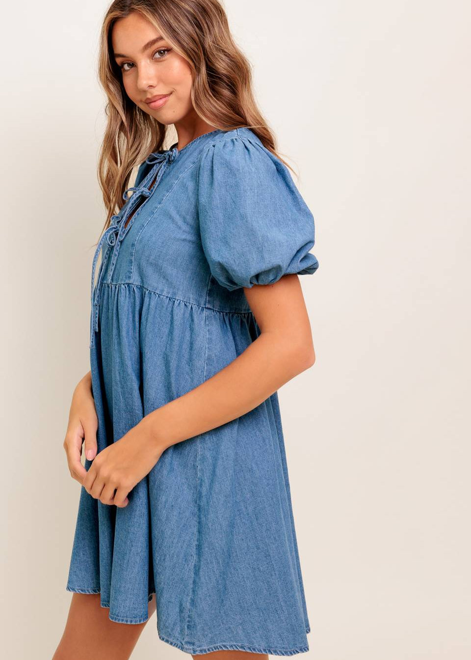 THE ELOWEN BOW-TIE DENIM MINI DRESS
