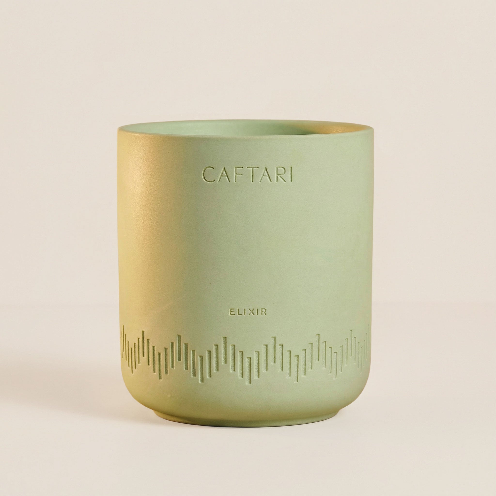 Caftari Elixir bergamot essential oil candle designed to promote energy, creativity, and mood uplift Main image