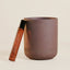 soy coconut candle and fragrance roller set with warm oud and patchouli scent