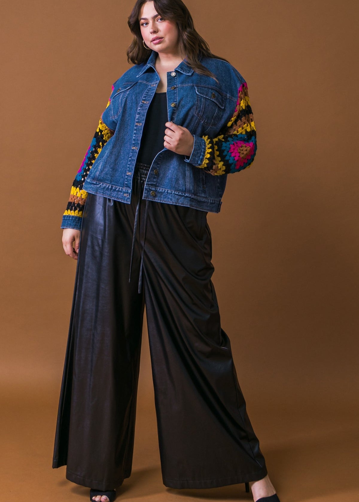Plus size washed denim jacket with crochet contrast sleeves full body view