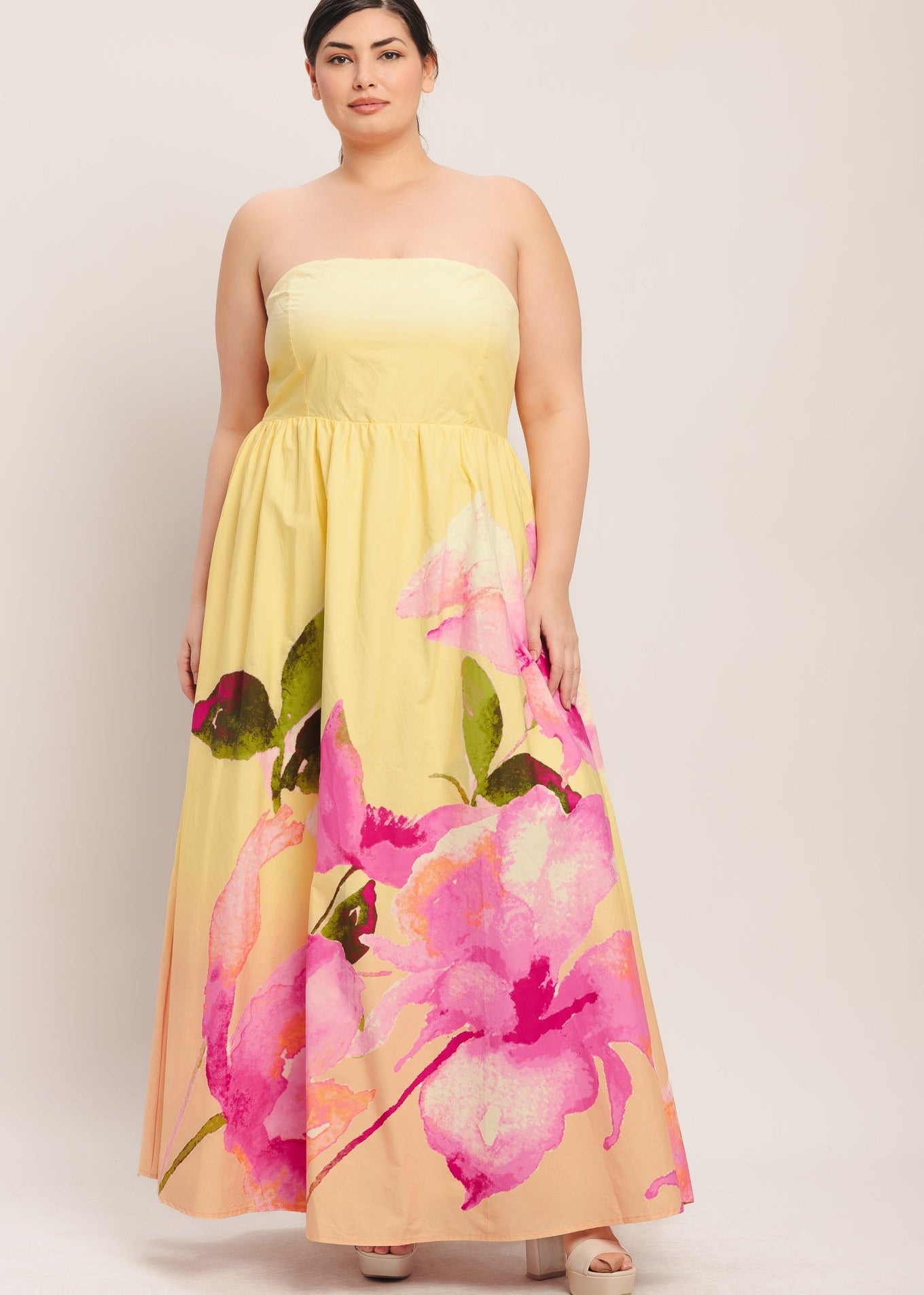 Full view of plus sized yellow maxi dress