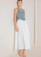 Side view of halter denim bodice midi dress with full woven skirt