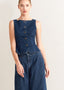 Winged Meadow Co. dark wash denim sleeveless vest with wide neckline and front button closure.