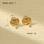 Coastal-inspired shell earrings in gold and silver tones styled flat lay