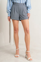 Tailored cotton blend woven shorts with cuffed hem and adjustable side tab