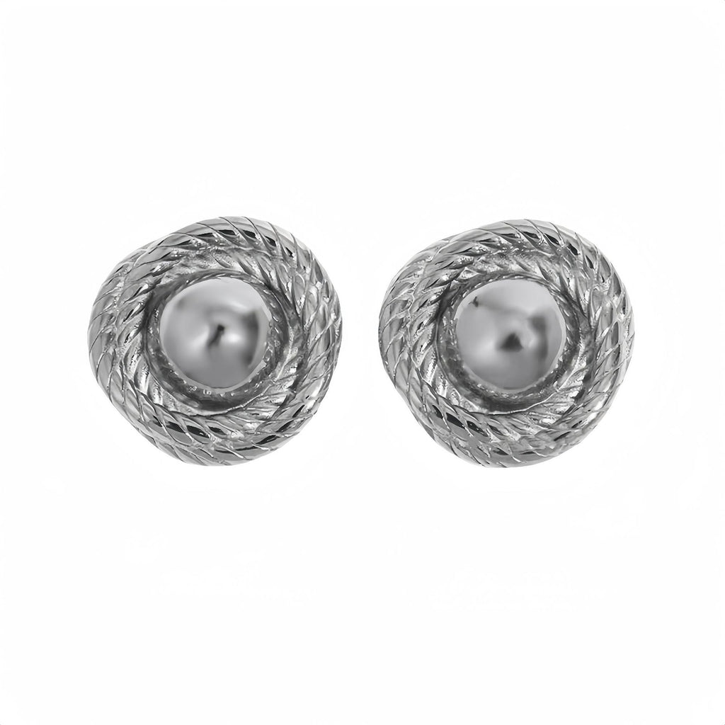 Silver spiral statement stud earrings with textured detailing