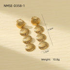 Gold shell-shaped earrings on a beige background with measurements and weight information.